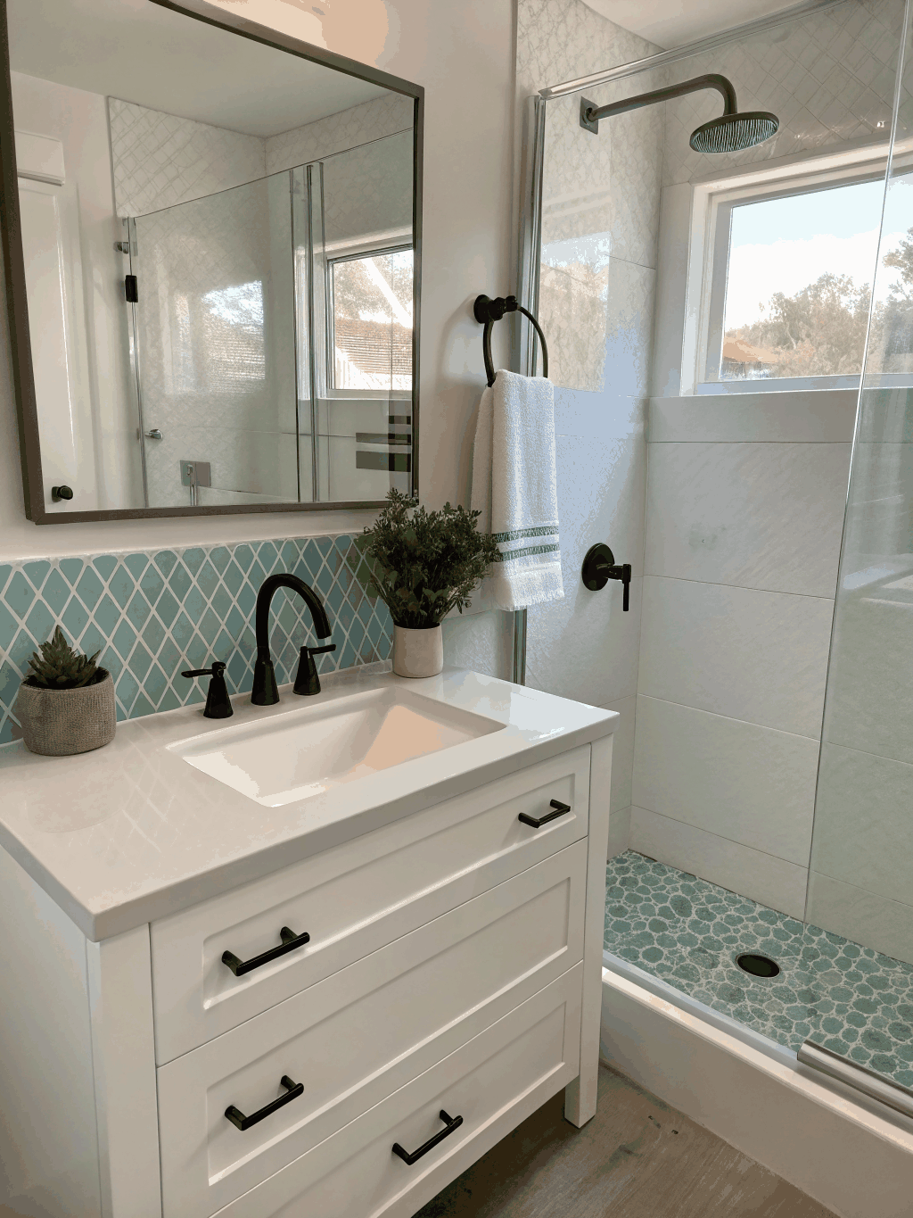 Modern primary bathroom transformation in an Austell split-level home with zero threshold glass shower