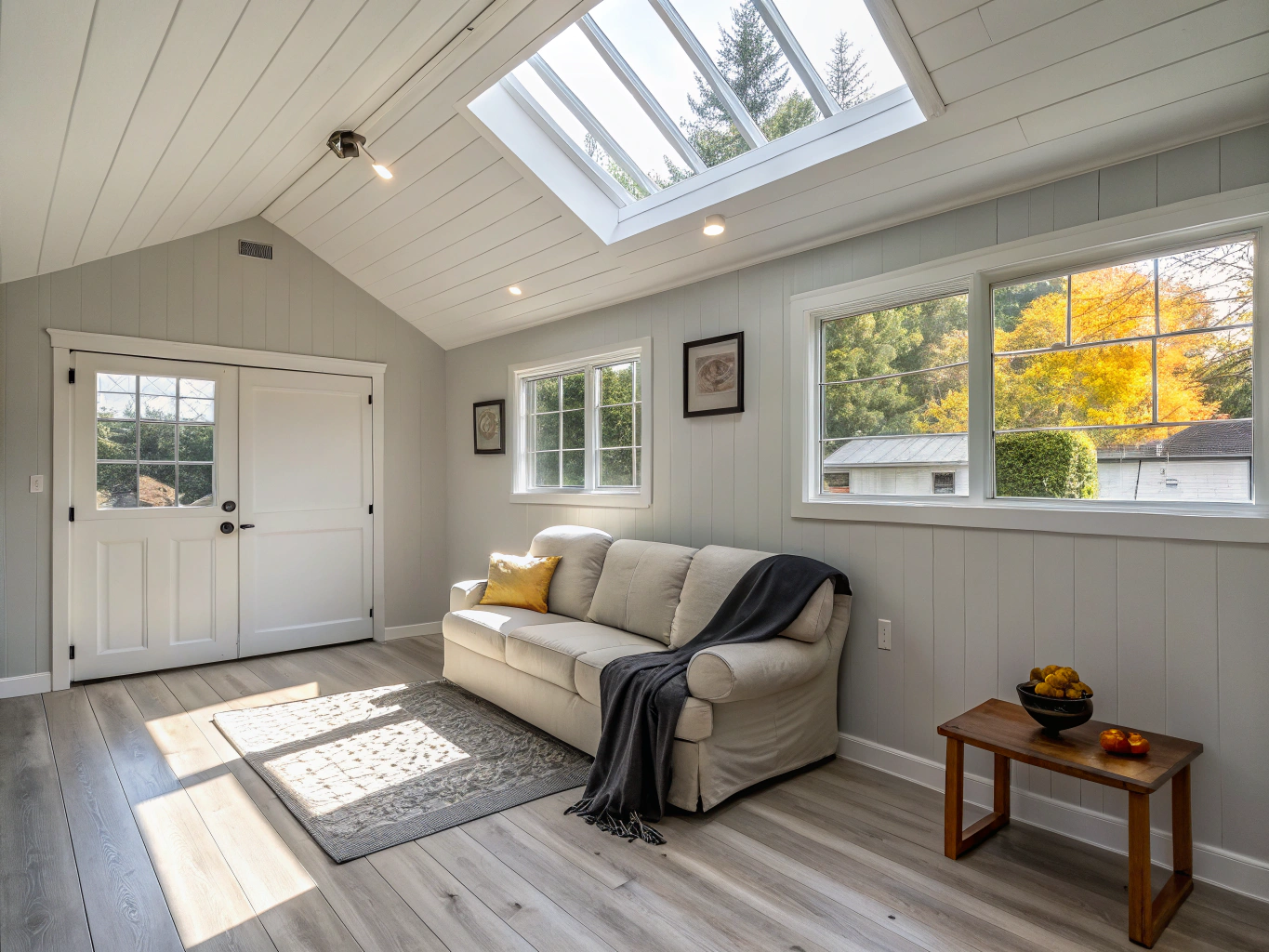 Converted double car garage into a bright family bonus room and guest suite with insulated subfloor and recessed lighting